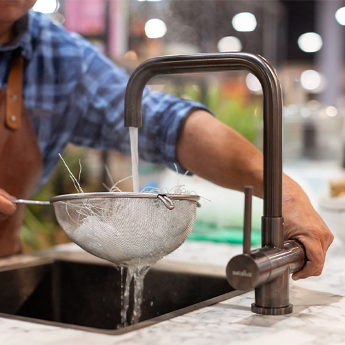 De kopere Selsiuz kokend water kraan bij Kokendwatergigant